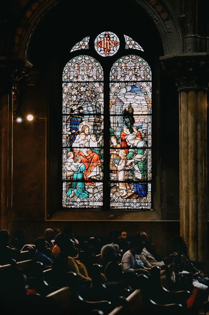 Some stained-glass windows from the previous congregation remain.