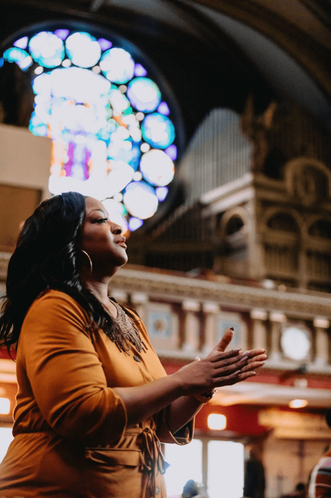 A congregation member during an early March service at New Mount Pilgrim.