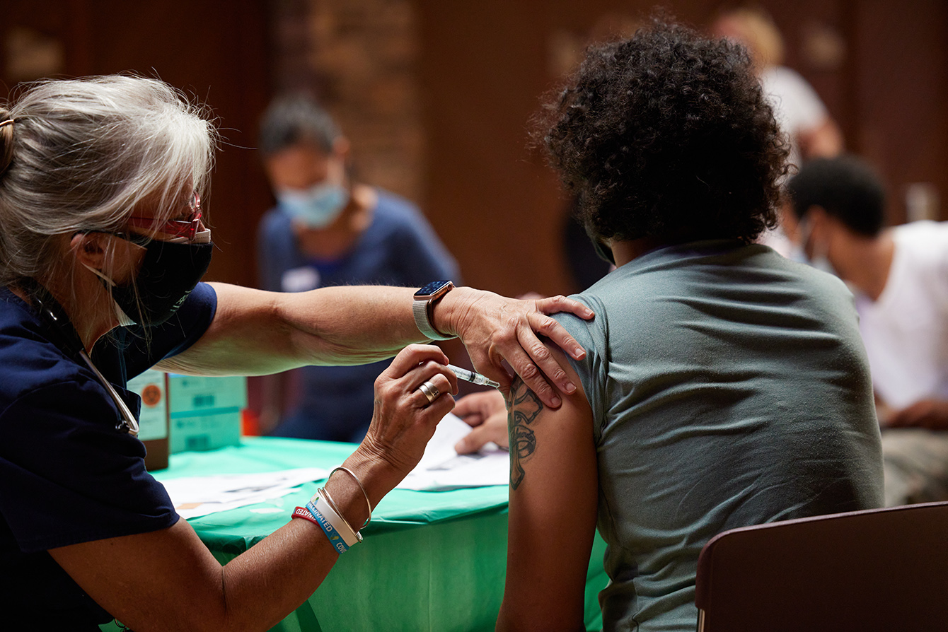 person receives a vaccine