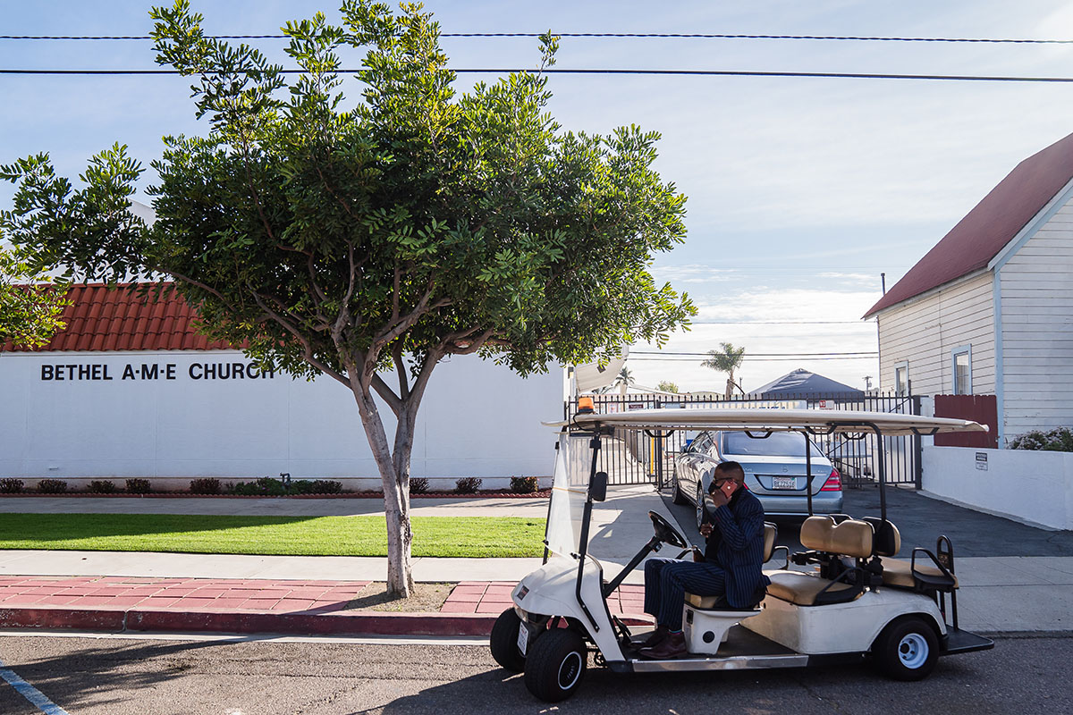 Vaughn rides a golf cart