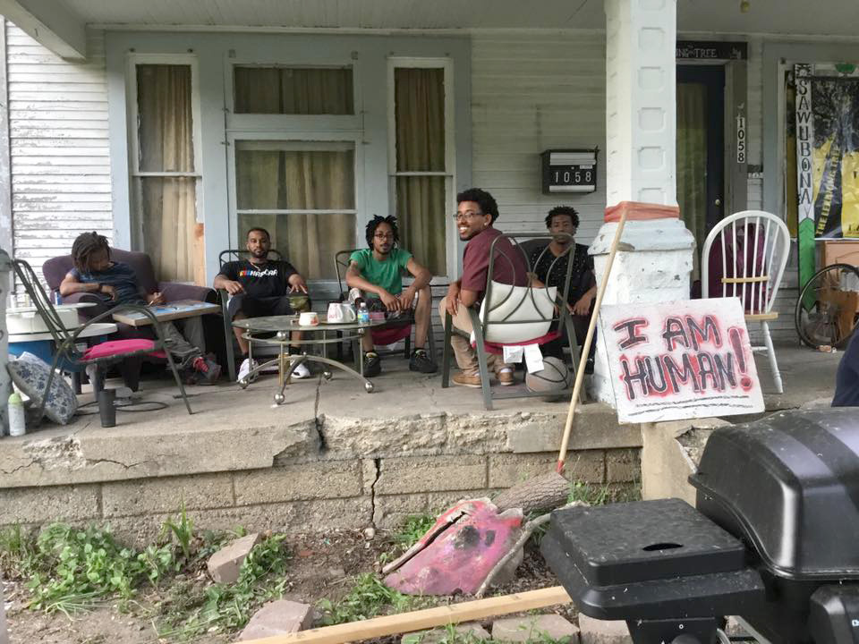 people sitting on a porch