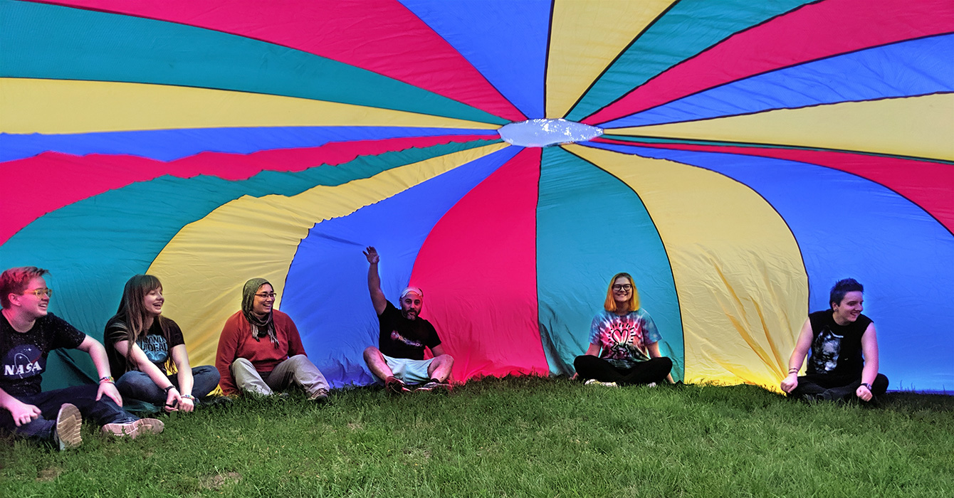 people using a parachute