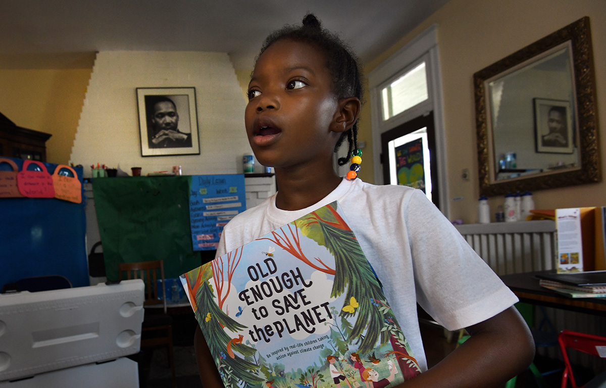 child with book