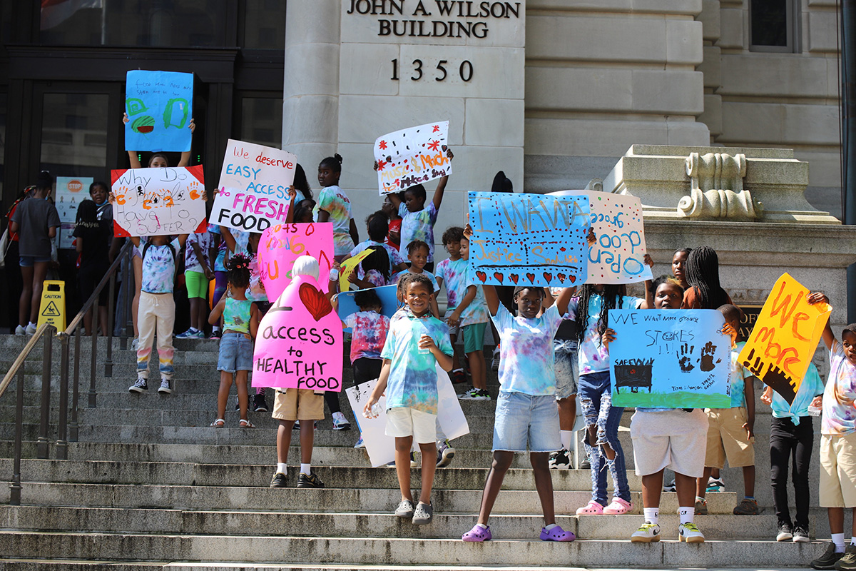 children with protest signs