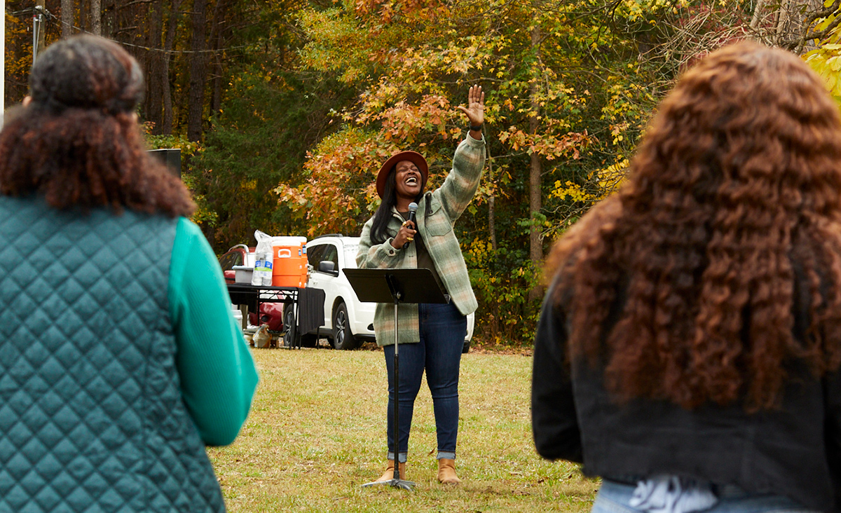 woman preaches to group