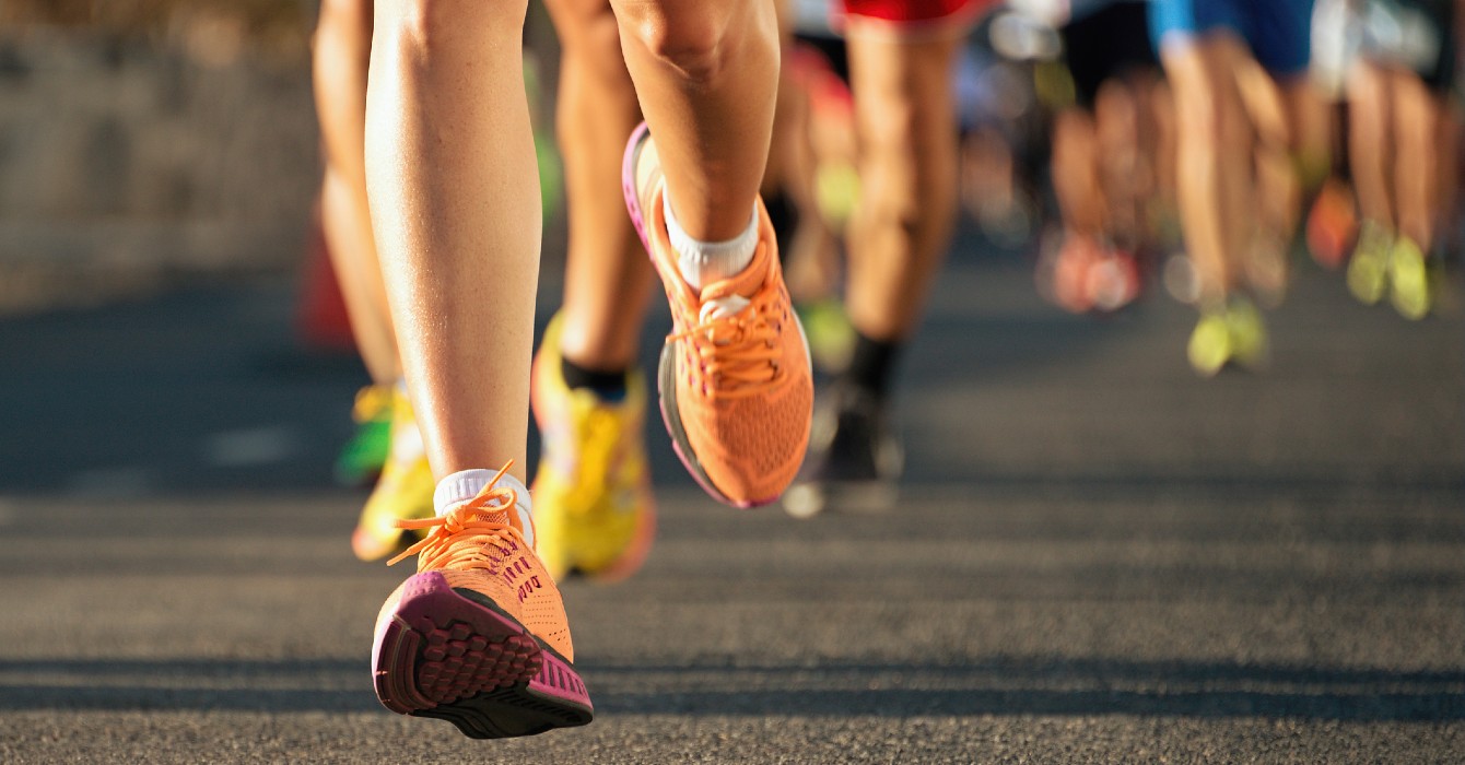 image of the feet of a group of runners