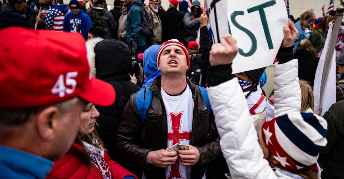 Protestors on January 6 praying