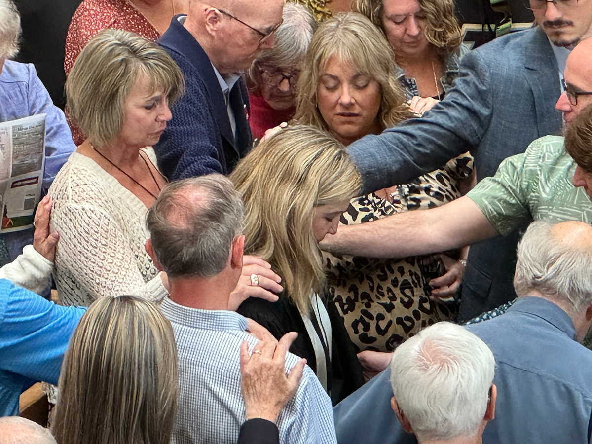 Laying of hands with Shelly Wood