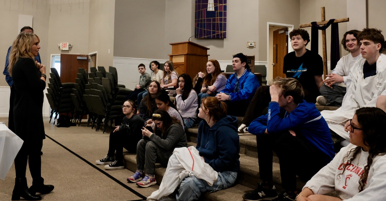 Photo of a director instructing students