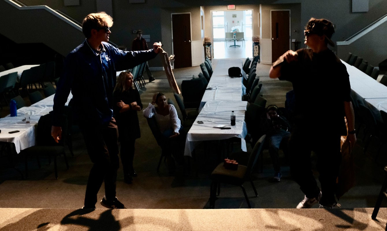 Image of actors rehearsing in a sanctuary