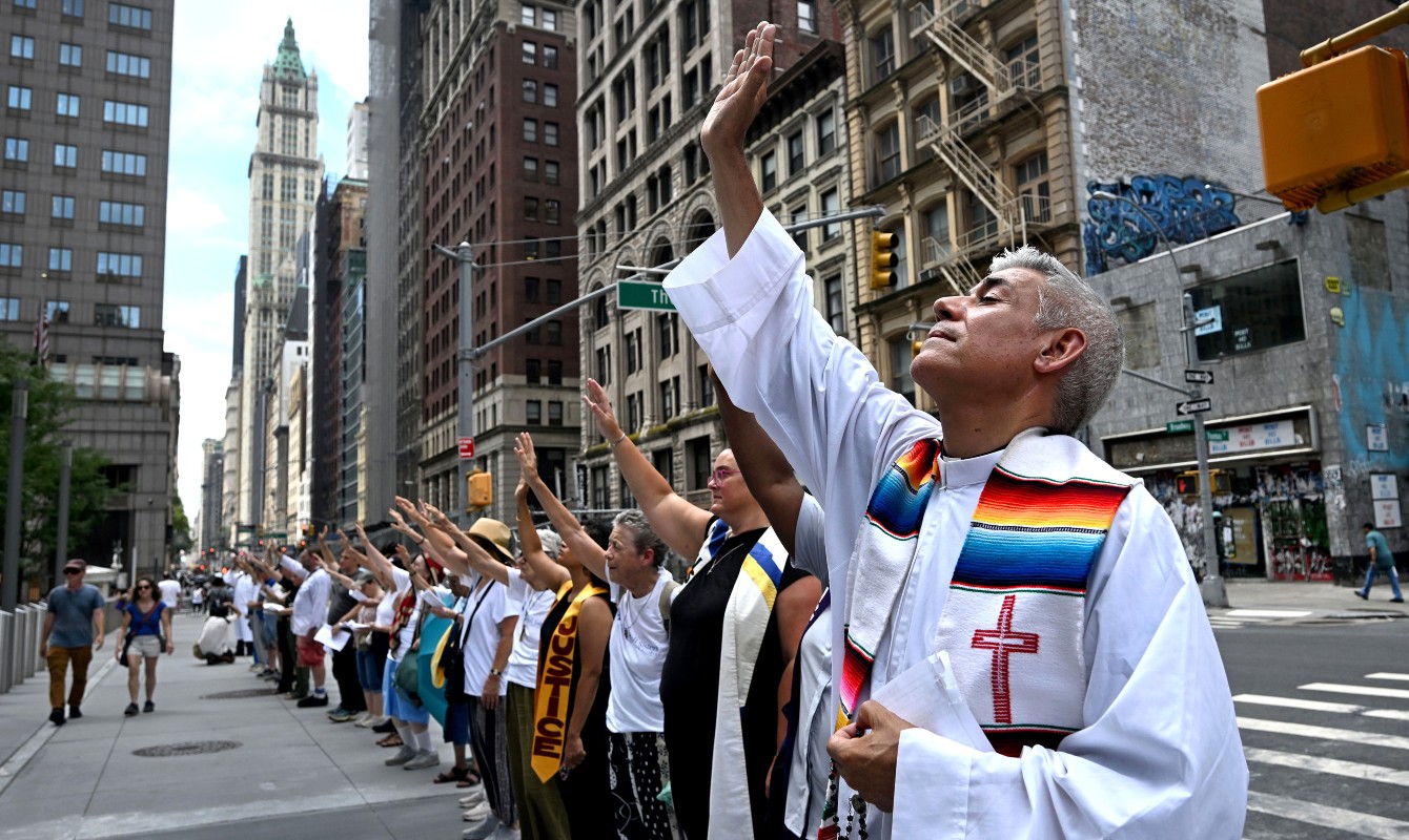 Photo of a priest at a protest