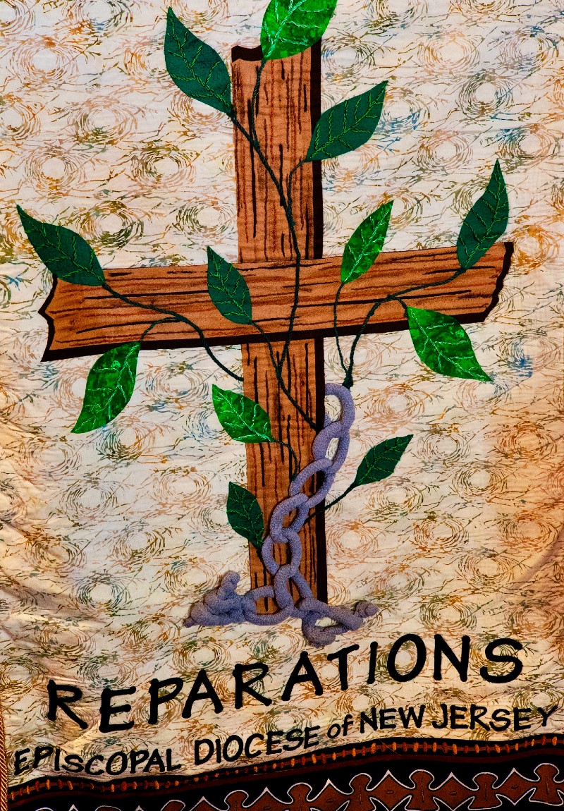 photo of a banner that says "Reparations: Episcopal Diocese of New Jersey"