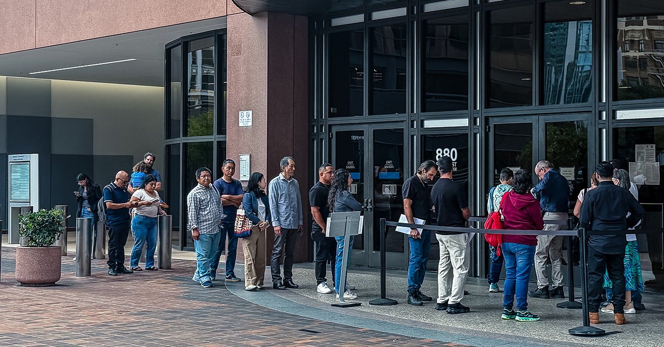 Image link to article: A group of volunteers offers a faithful presence in San Diego’s immigration court