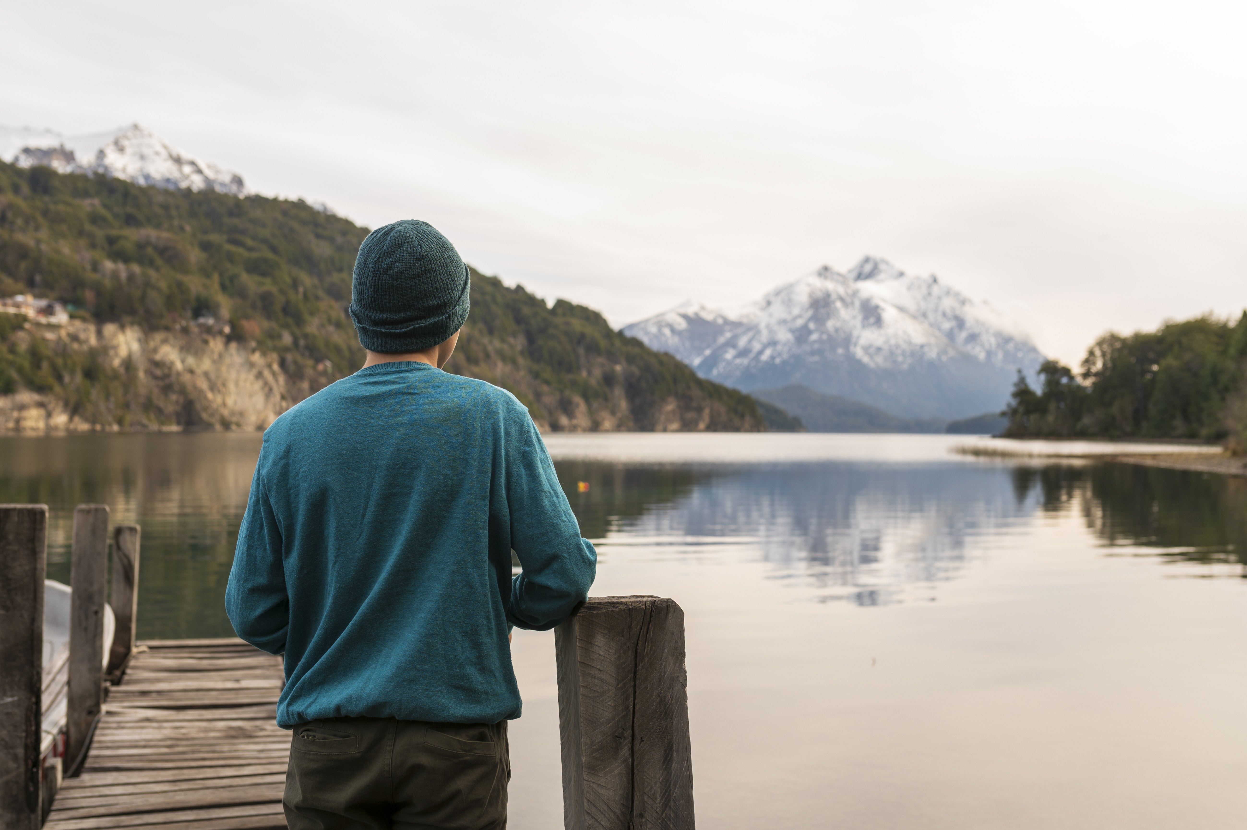 Young man taking a picture during a walk