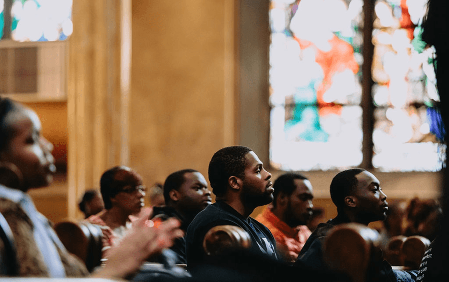 black people praying in church