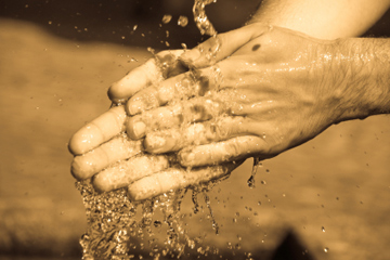 Image link to article: Washing hands and prayer