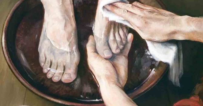 Jesus washes an apostle's feet