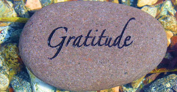 Rock inscribed with the word "Gratitude"