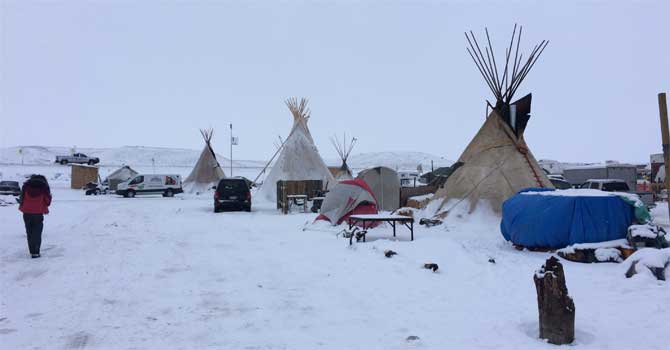 Teepees in the snow at Standing Rock
